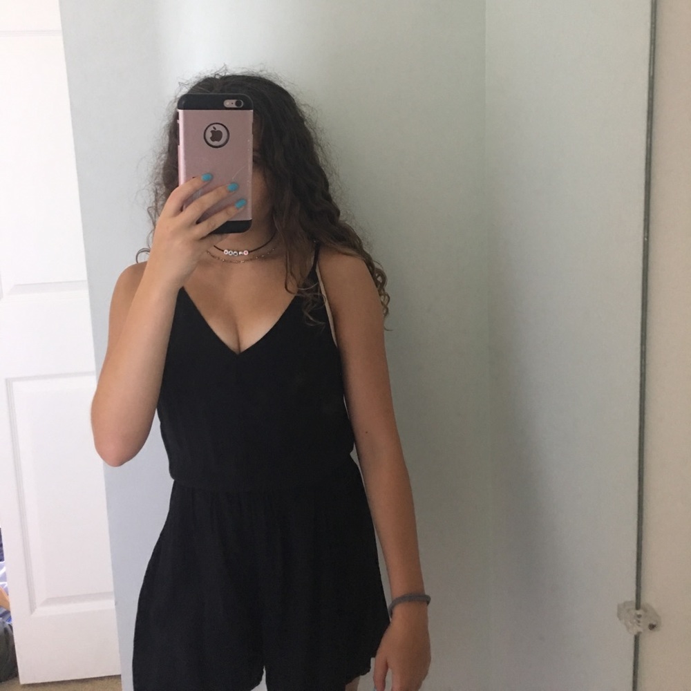 Black romper with adjustable straps